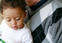 손주를 키우는 할머니할아버지를 위한 주거 복지, NC 지역도 필요한 이유 man carrying baby close-up photography