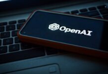 OpenAI GPT-5.4 출시, NC 한인들의 일상 업무가 바뀐다 a cell phone sitting on top of a laptop computer