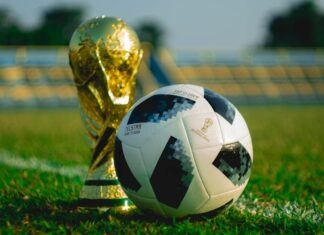 2026 월드컵 일정과 개최지, NC에서 경기 관람하는 방법 soccer ball beside trophy on soccer field